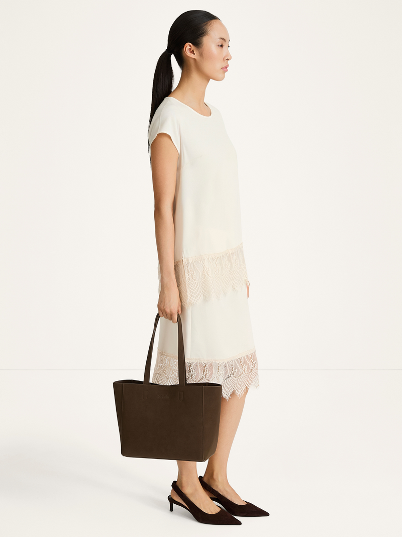 Voir le produit 'Stylein Blouses Off White' (en anglais) Stylein Blouses Off White